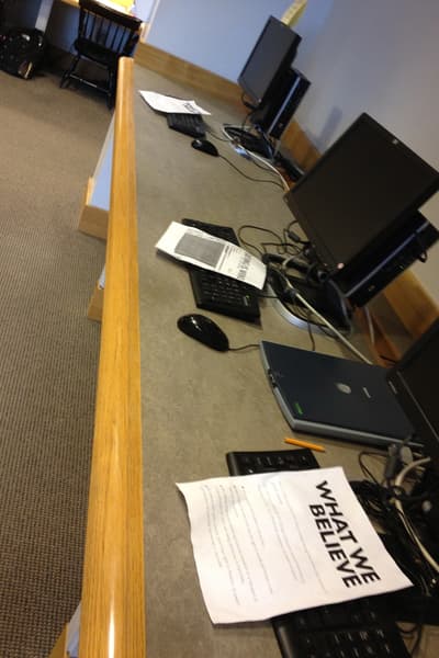 Occupy flyer at computer stations in the library