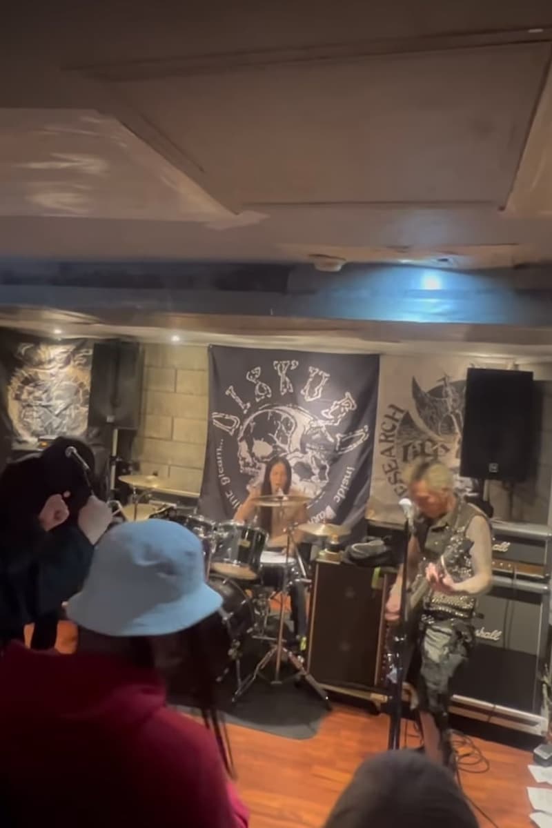 DISTU, unknown second act (partially visible banner on right)
